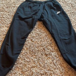 Size medium men’s Nike joggers great condition with pocket on back